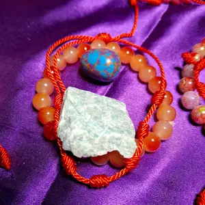 Fertility and protection bracelet plus crystal egg for charging.