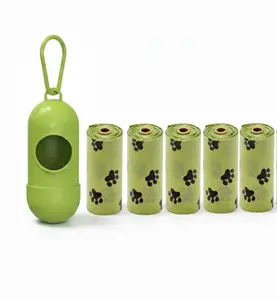 4 Eco-Friendly Green Dog Waste Bags with Black Paw Print Design Includes Recyclable Paper Roll Core 6CM x 2.7CM