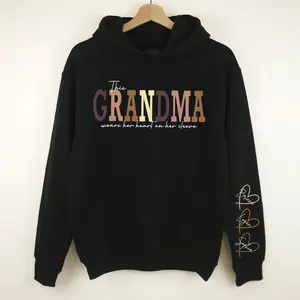 This Grandma Wears Her Heart On Her Sleeve Hoodie, Personalized Grandma Sweatshirt Names On Sleeve, Mother's Day Gift Nana Heart On Sleeve Crewneck