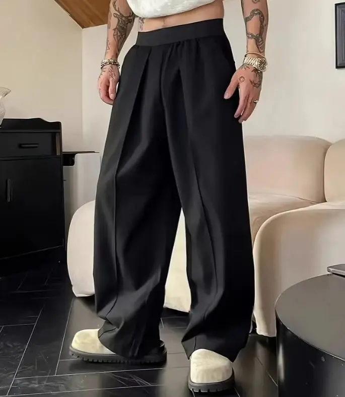 Unisex solid color wide leg pants with a wide waistband and accordion pleats – smooth, wrinkle resistant woven fabric, 3D front pleats, high stretch elastic waistband, side pockets, American minimalist relaxed fit for daily commuting and home