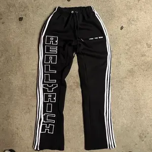 STACKED FLARED SWEATPANTS