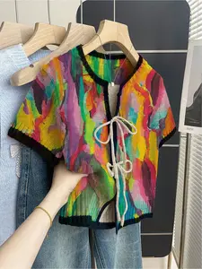Women's khaki bohemian vacation short-sleeve knit top. Loose round neck, contrast graffiti print, front tie and contrast piping. Comfortable for spring & summer casual wear Womenswear.