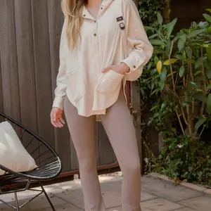 Raw Hem Casual Pullover - Soft Beige Long Sleeve Top with Pockets & Button Closure for Everyday Wear