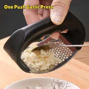 Stainless Steel Garlic Press – Compact, Easy-to-Clean Garlic Crusher for Everyday Cooking