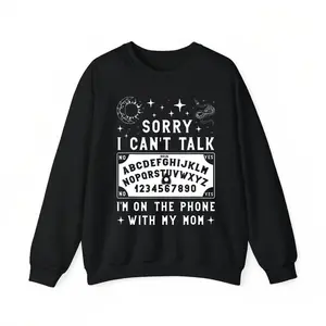 Sweatshirt with “SORRY I CAN'T TALK I'M ON THE PHONE WITH MY MOM” Text & Ouija Board Graphic