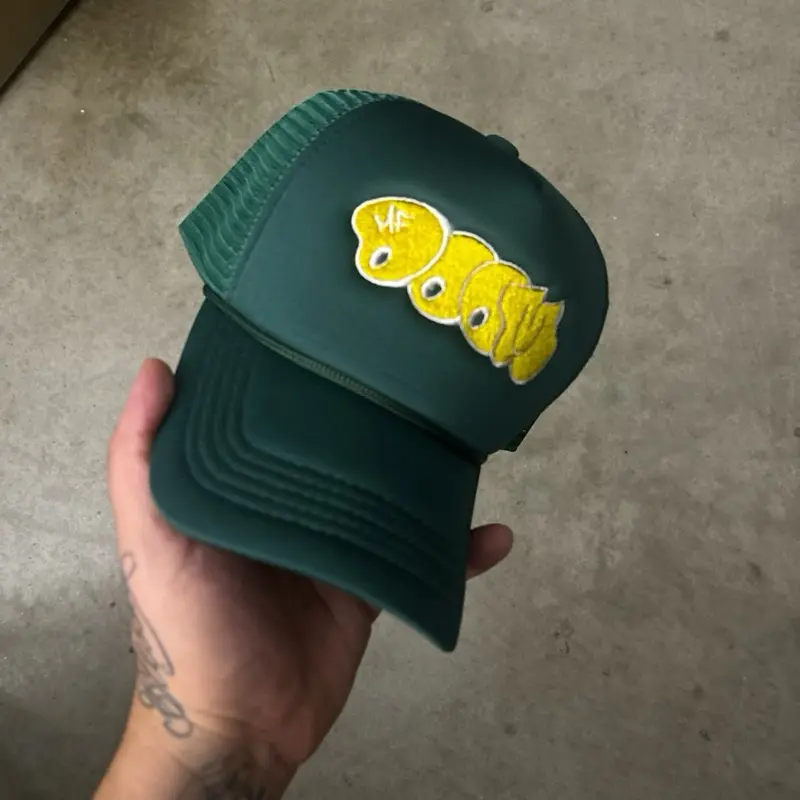 DOOM Trucker Hat with Yellow Heart Design Green Color and Unique Emblem