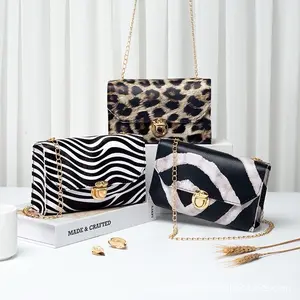 Elegant Animal Print Handbags - Zebra & Leopard Patterns with Gold Chain Straps for Women's Fashion Accessories