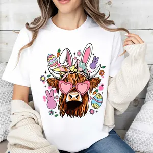 Personalized casual print design, a white casual crew neck short-sleeve T-shirt with rabbit ears and Easter egg patterns, suitable for women to wear during celebrations