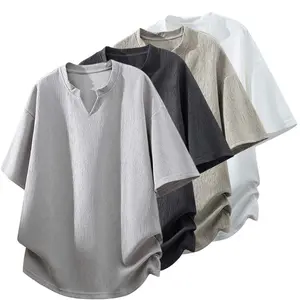 Men’s summer short-sleeve T-shirt with a subtle textured Henley collar, breathable cool feel, loose fit, small V-neck, light luxury premium look, solid color—ideal for everyday wear and commuting, casual style.
