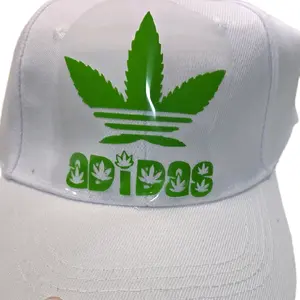 Adidos Funny Hats Ab Decor White Cap with Green Leaf Logo Design