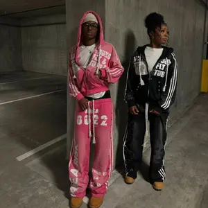 Harajuku retro streetwear two-piece set: hip-hop rock patch printed loose hoodie and men’s and women’s sports pants GARMENTARY