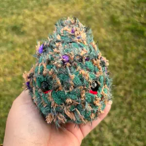 Adopt Your cuddly crochet dragon fruit pocket buddy