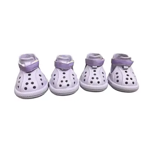 A Set of 4 Purple Crocks Size # 9