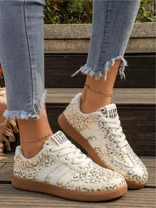 Spring and Autumn new hot stamping leopard print German training shoes for women, retro striped casual board shoes, light luxury style commuting sports shoes