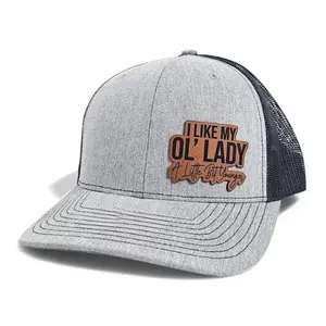 I Like My Ol’ Lady Younger trucker hat with bold humor, adjustable cap for men, fun matching gift idea for couples.