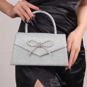 Luxury Silver Glitter Handbag with Crystal Bow Evening Party Purse for Special Occasions Elegant and Sparkling