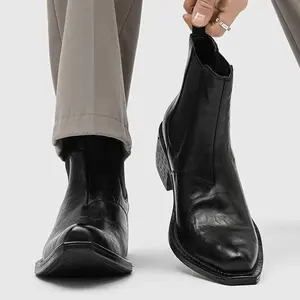 Men’s ruched upper Chelsea ankle boots featuring side stretch fabric, a pointed square toe, and a textured chunky heel—retro Western frontier design.