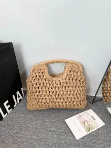 Handwoven Natural Raffia Tote Bag Khaki Color Openwork Design Sturdy Structure with Ample Capacity Versatile Women's Bag for Spring/Summer Vacations and Commuting