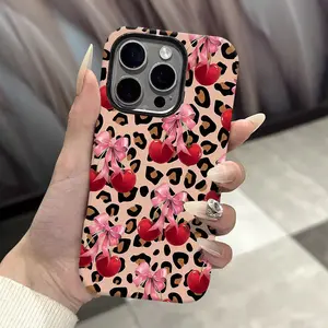 This durable, shock-absorbing, glossy 2-in-1 phone case features a bow, cherry, and leopard print design. It's compatible with iPhone 17, 16, 15, 14, 13, 12, 11, X, and Samsung models. A perfect holiday gift for friends or family.
