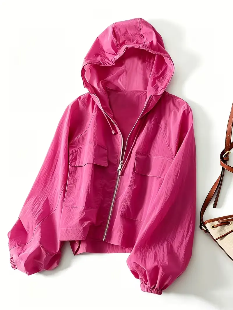 Women's cropped, loose-fit zip-up hoodie featuring raglan sleeves, large patch pockets, an adjustable drawstring hood, and elastic cuffs; a versatile, minimalist, and casual piece perfect for daily commutes or outings, offering a relaxed, laid-back vibe.