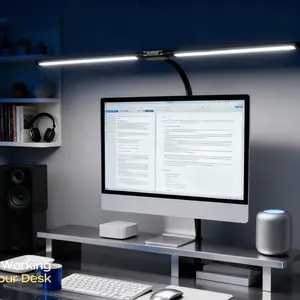 Double-ended LED desk lamp, flexible soft neck, USB-powered, multi-color temperature adjustment, reading, drawing, office, computer monitor, lamp that clips onto the desktop, adjustable brightness, black workspace lighting, streamlined design, portable