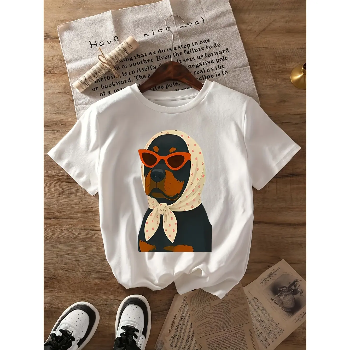 Men's Fun Rottweiler wearing sunglasses and a headscarf Graphic T-Shirt - Short Sleeve Crew Neck Regular Fit Casual Wear |   Soft & Breathable Fabric, Durable Print, Everyday Comfort, Machine Washable, Flat lay photography, casual, artistic, vintage props