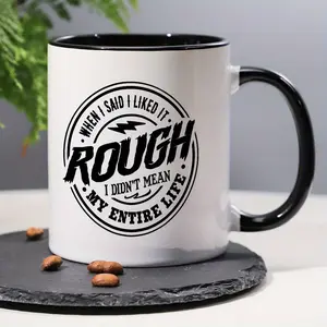 1 count Funny Coffee Mug - 'When I Said I Liked It Rough, I Didn't Mean My Entire Life' - 11oz White Ceramic Cup with Black Text & Lightning Bolt Design - Perfect Humorous Gift for Office, Home, or Parties, Coffee Cup