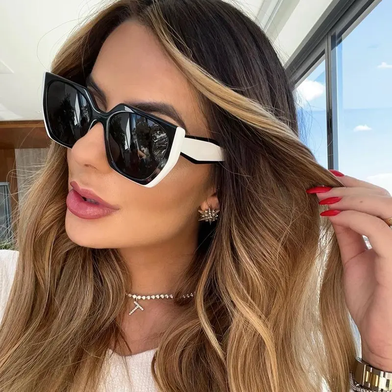 Fashion cat-eye wide-rimmed sunglasses, women's style, high-end texture. Full-frame design, UV protection.