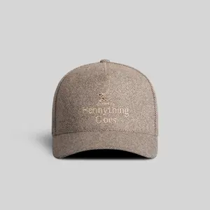 Field Grade Hennything Goes Herringbone Brown | trucker hat | herringbone pattern | mocha wheat | embroidered | adjustable | mesh back | unisex | casual | streetwear | dad hat | vintage | graphic | Trendy Hat 2026 | Streetwear Headwear | Fashion Cap