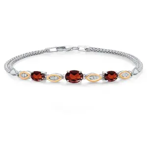 Gem Stone King 925 Silver and 10K Yellow Gold Red Garnet and White Lab Grown Diamond Bracelet For Women (2.07 Cttw, Gemstone January Birthstone, Oval, Wheat Chain, 6.5/7/7.5 Inches)