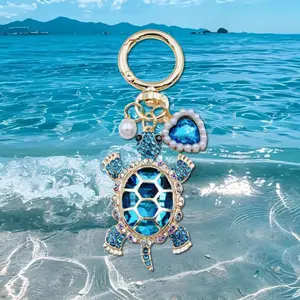 2026 New Sparkling Blue Crystal Sea Turtle Keychain, Cute Ocean Themed Bag Charm with Pearl & Heart Pendant, Gold Tone Rhinestone Turtle Keyring for Women, Perfect Beach & Holiday Gift