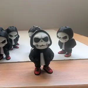 Glow in the Dark Hoodie Skeleton Backpack Key Chain - Unique Design with Red Shoes and Black Hood