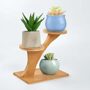 Modern Bamboo Plant Stand with 3 White Ceramic Planters Small Indoor Display Rack for Compact Spaces and Plant Enthusiasts