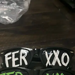 Feid feexxo black frame glasses w white vinyl Feid feexxo black frame glasses w white vinyl