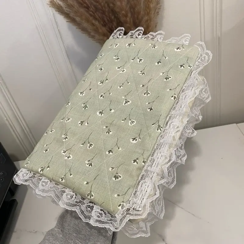 Handmade fabric Bible cover in sage green with floral design and lace trim custom size