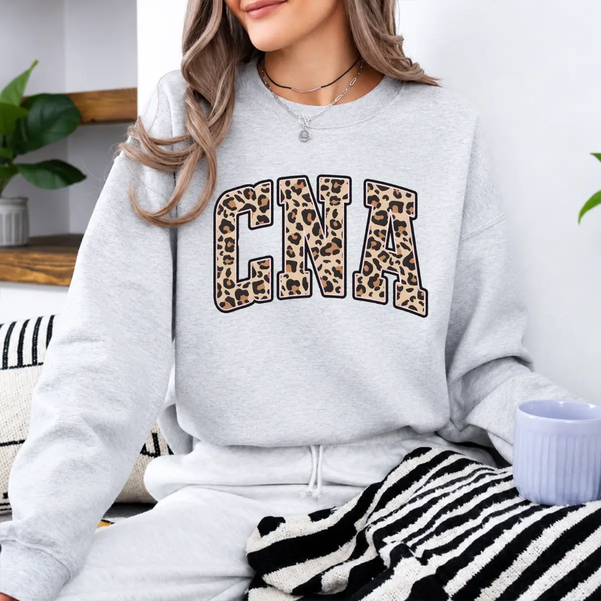 CNA Leopard Print T-Shirt & Sweatshirt, Funny Certified Nursing Assistant Graphic Tee, Minimalist Healthcare Shirt, Nurse Appreciation Gift for CNA Medical Workers - DPCLICK