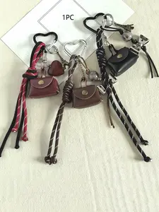 Personalized braided rope retro mini bag pendant, niche design light luxury exquisite casual versatile bag key chain accessories decoration, heart-shaped buckle creative modeling suitable for daily bag matching, Bag Charm Keychain