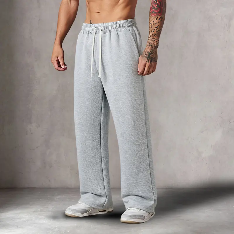 Cotton sweatpants, men’s athletic pants, loose fit, drawstring waist, versatile casual men’s pants suitable for everyday wear in autumn and winter, fashionable menswear. Composition: 65% cotton, 35% polyester.