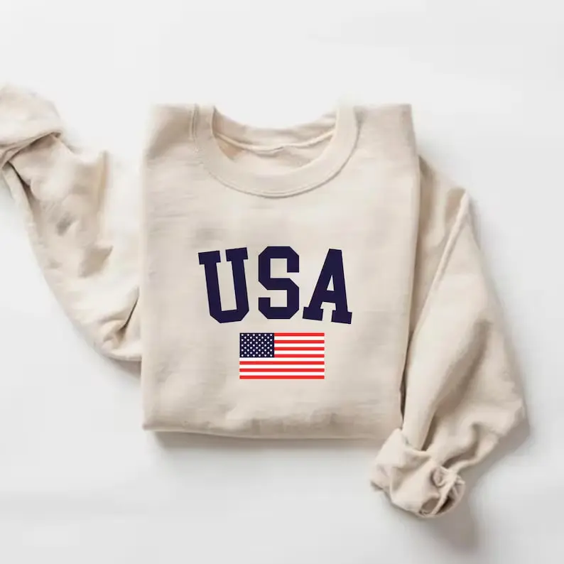 This USA flag sweatshirt is a retro patriotic American  combining classic style, comfort, and national pride for everyday casual wear.