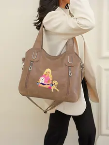 This leather tote bag features Barbie doll and dog designs, with a zip closure. It's perfect for the back-to-school season and a great New Year's gift.