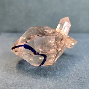 Enhydro Crystal with Varying Colors and Crucial Features