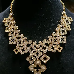 Luxury Clover Bib Necklace with Gold Stones Elegant Design Versatile Appeal Metal Coating Jewelry