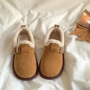 Women’s cozy fleece-lined slip-on moccasins — soft brown winter shoes with an adjustable buckle strap, plush lining, and a non-slip rubber sole for indoor/outdoor comfort; cozy shoes, indoor footwear, plush lined interior
