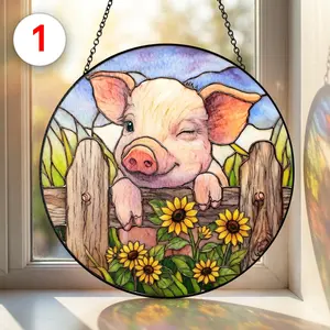 Handmade stained glass round window ornament featuring a piglet and flowers. A perfect gift for pig lovers.