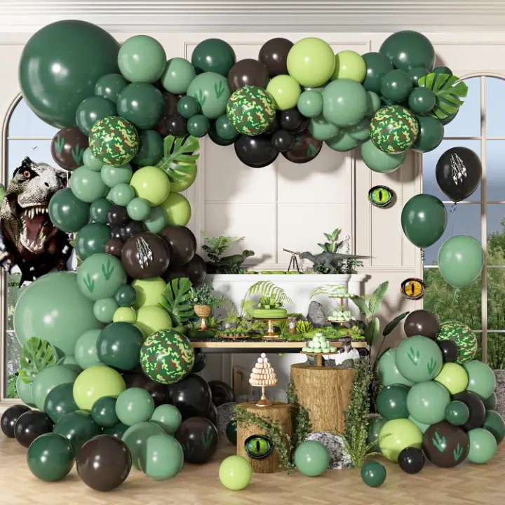 Dinosaur Party Decorations - Green and Black Balloon Arch with Leaf Patterns for a Prehistoric Theme