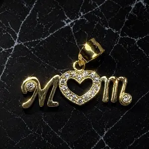 10K  Gold “Mom” Heart Pendant