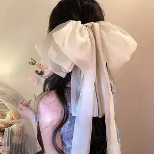 Elegant and sophisticated large bow ribbon hair clip