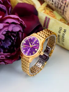 A ladies' golden precision steel strip, high-end design for workplace and business, atmosphere and temperament, trendy hollow out Self Winding Watches fully automatic mechanical watch Stainless Steel Wristwatch