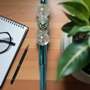 Teal Horizon Owl Statement Pen with Unique Design and Teal Color Body