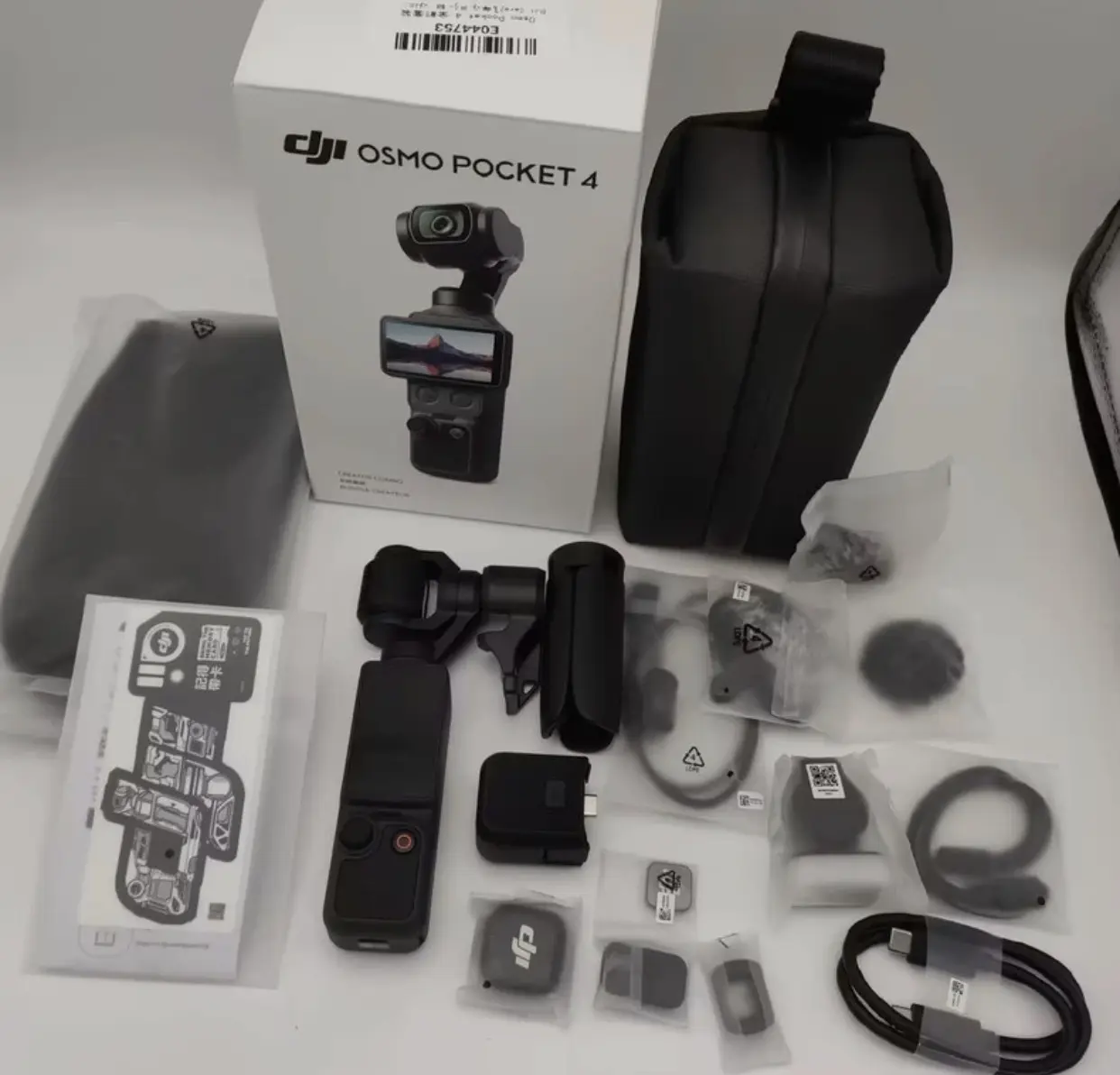 DJI OSMO Pocket 4, Portable Action Camera for Vlogging & On-The-Go Photography (Electronics, Cameras & Accessories)
